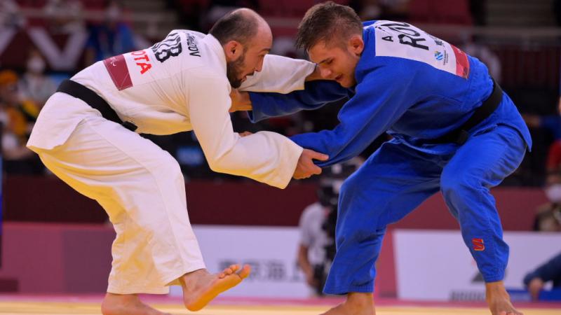 Two males judokas in action at Tokyo 2020.